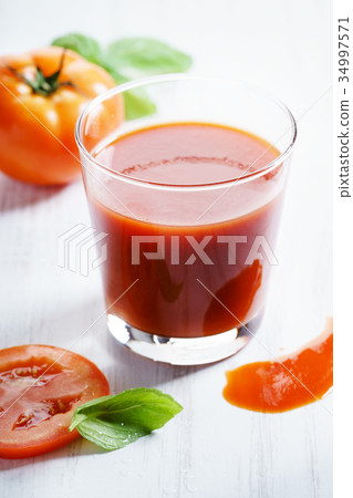 tomato juice. tomato juice. 34997571