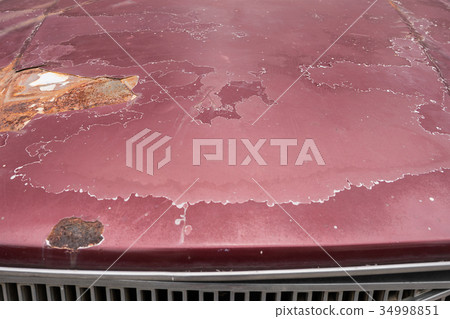 Close up of cracked and peeling paint of old car Close up of cracked and peeling paint of old car 34998851