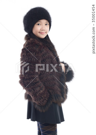 Asian girl in winter clothes on white background 35001454