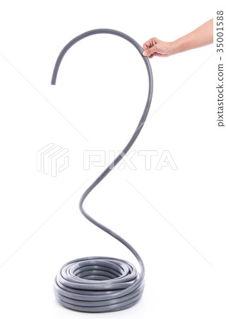 curled garden hose isolated on white 35001588