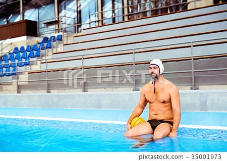 Water polo player in a swimming pool. 35001973