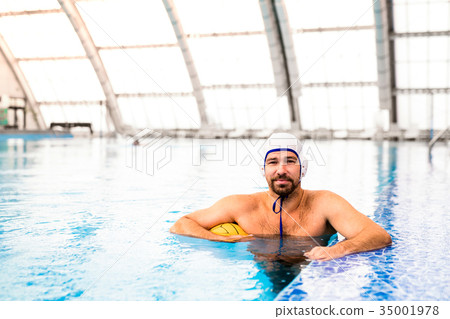 Water polo player in a swimming pool. 35001978