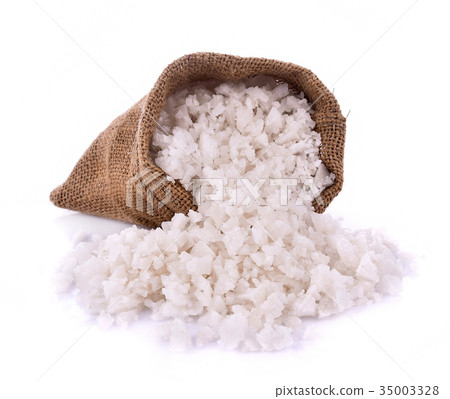 Sea salt in jute sack on white background Sea salt in jute sack on white background 35003328