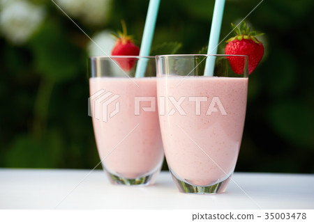 Glasses of fresh smoothie with strawberry 35003478