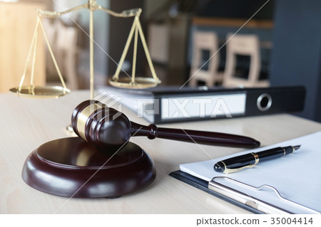 Close up of gavel and scales of justice and Report the case with 35004414