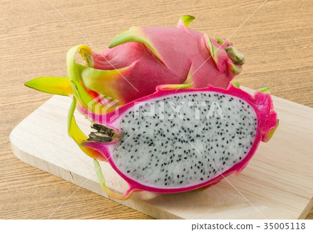 Fresh Ripe Dragon Fruit on Cutting Board 35005118