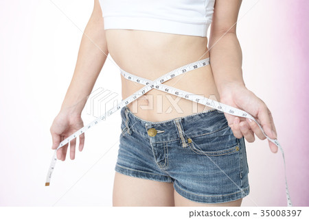 Women measuring abdominal girth 35008397