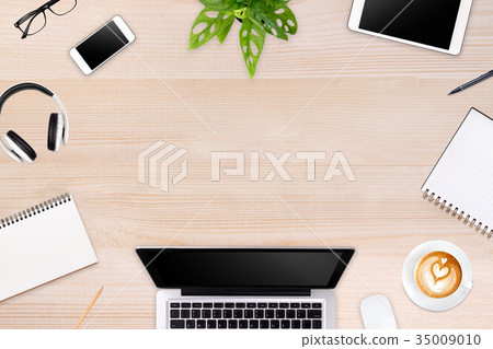 Modern workspace with laptop tablet, smartphone  35009010