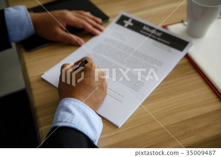 Closeup hands of Businessman sign contract Closeup hands of Businessman sign contract 35009487