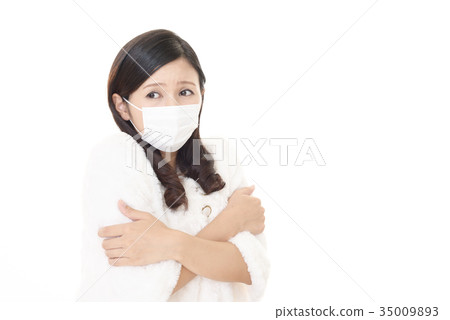 A woman with a cold A woman with a cold 35009893