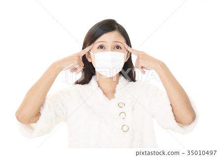 A woman with a cold 35010497