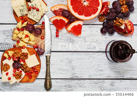 Gourmet cheese assortment on wooden table Gourmet cheese assortment on wooden table 35014466