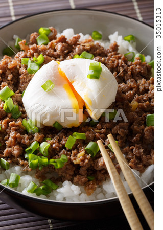 Beef Soboro with egg poached, rice and green onion Beef Soboro with egg poached, rice and green onion 35015313