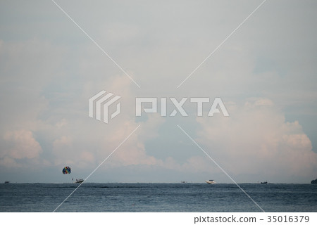 Natural landscape. Land, blue sky and sea with boa Natural landscape. Land, blue sky and sea with boa 35016379