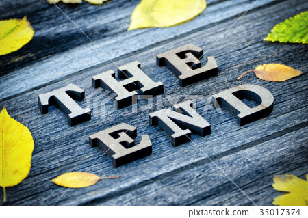 Inscription The end and yellow leaves  35017374
