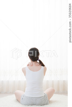 Woman doing self massage, neck, shoulder 35020684