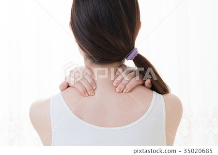 Woman doing self massage, neck, shoulder 35020685