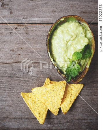 Avocado sauce with nachos Mexican food Avocado sauce with nachos Mexican food 35022278