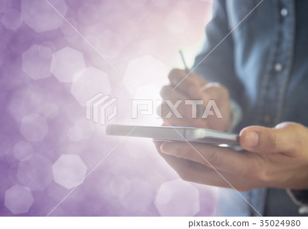Human using mobile smartphone Human using mobile smartphone 35024980