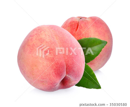 two whole of peach with green leaves isolated two whole of peach with green leaves isolated 35030580