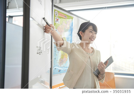 Language School Instructor Woman teaching Korean Language School Instructor Woman teaching Korean 35031935