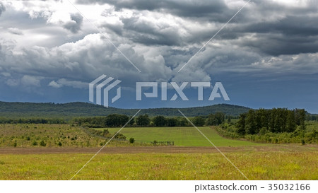 Dramatic clouds on the Hungarian landscape 35032166