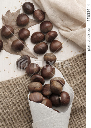 chestnuts on a table chestnuts on a table 35033644