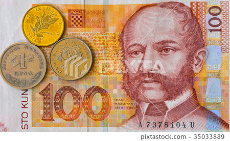 Croatian currency note 100 Kuna banknote and coins Croatian currency note 100 Kuna banknote and coins 35033889