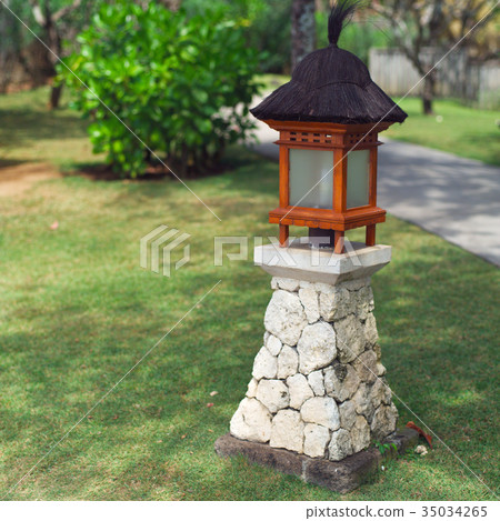 Balinese lanterns in the tropical garden Balinese lanterns in the tropical garden 35034265
