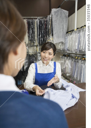 Woman asking cleaning shop 35035546