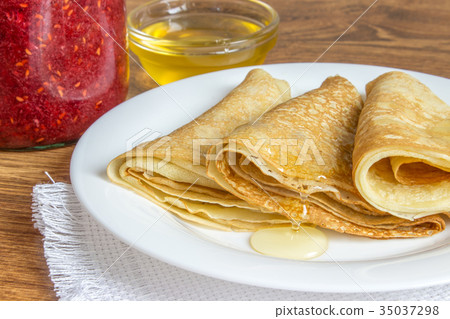Crepes with various dressings - jam and honey Crepes with various dressings - jam and honey 35037298