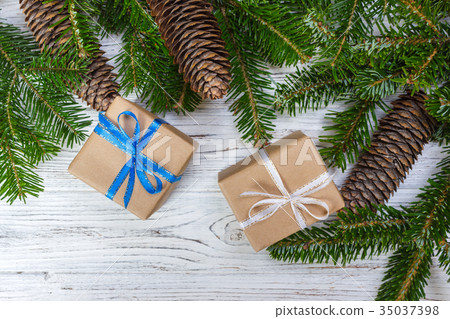 Christmas gift box on the white wooden table 35037398