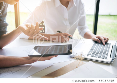 Two interior design or graphic designer at work on project of ar Two interior design or graphic designer at work on project of ar 35037856