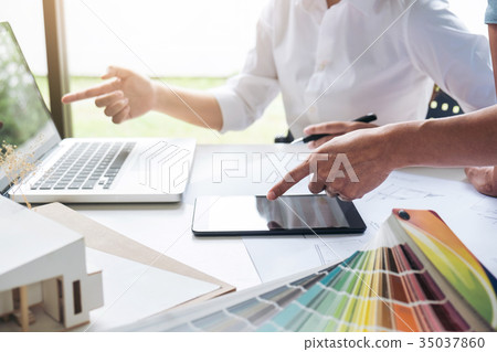 Two interior design or graphic designer at work on project of ar Two interior design or graphic designer at work on project of ar 35037860