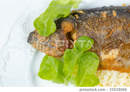 Whole pike perch with green salad Whole pike perch with green salad 35038066