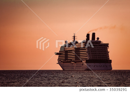 Giant cruise ship at sunset Giant cruise ship at sunset 35039291
