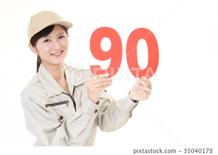 Female worker with numbers Female worker with numbers 35040178