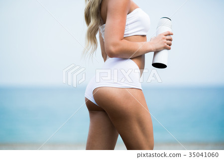 Beautiful young woman with long blond hair in 35041060