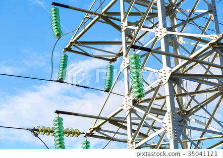 High voltage electric tower against the blue sky 35041121