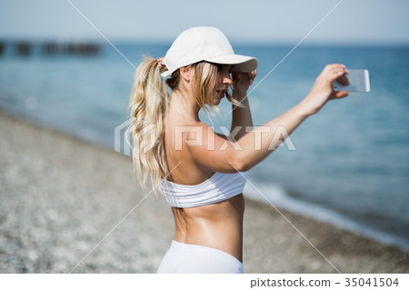 Fitness selfie woman self portrait after workout 35041504