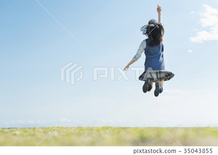 High school girl sea meadow jump High school girl sea meadow jump 35043855