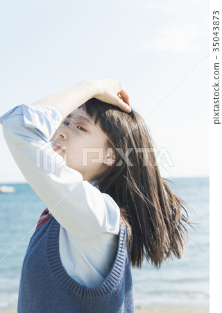 High school girl sea breeze hair flutters High school girl sea breeze hair flutters 35043873