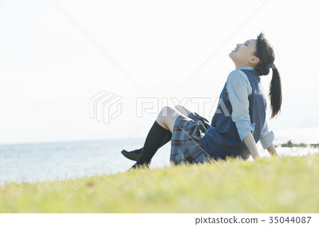 High school girl sea meadow sit 35044087