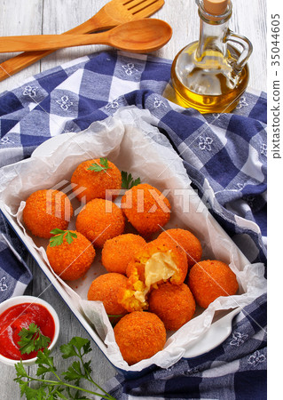 arancini - saffron rice balls stuffed with cheese 35044605