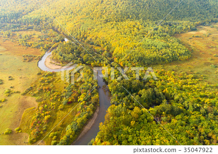 aerial shot of autumn forest and small river 35047922