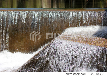 The waterfall from the small liver dam. The waterfall from the small liver dam. 35048333