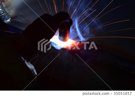 Metal Welding with sparks and smoke 35051857