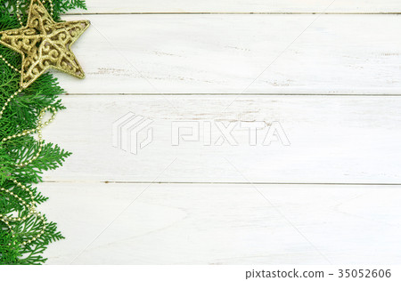 Pine leaf with yellow gold star and christmas ball Pine leaf with yellow gold star and christmas ball 35052606