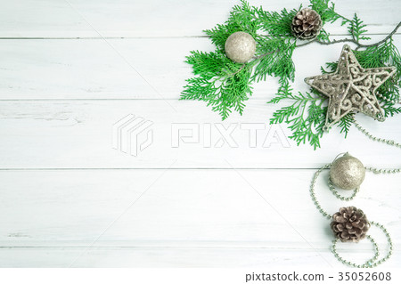 Pine leaf with silver star and christmas ball Pine leaf with silver star and christmas ball 35052608