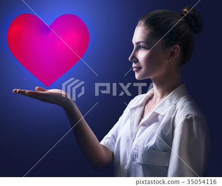 Cardiologist woman doctor holding big red heart. Cardiologist woman doctor holding big red heart. 35054116